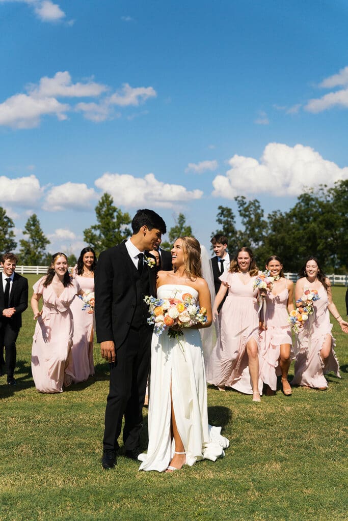 picture of the bride and groom with their bridal parties
