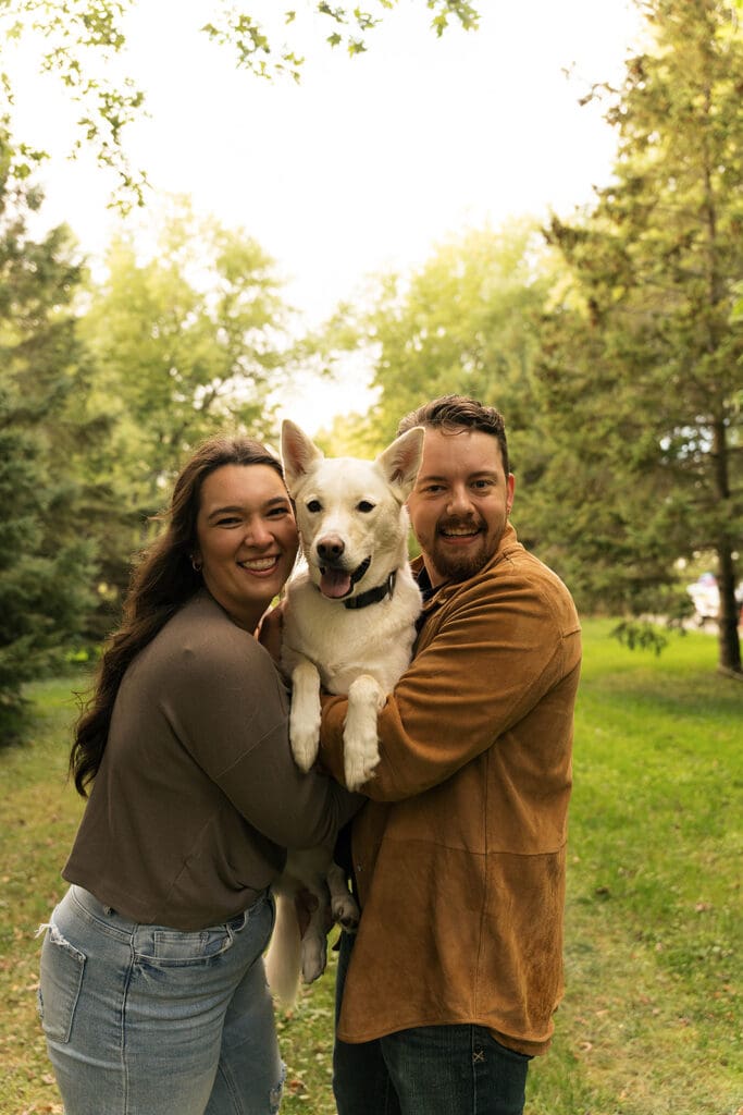 couple smiling at the camera during their session