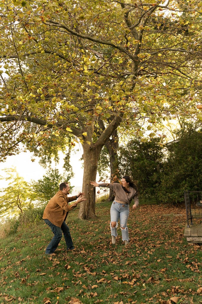 couple playing during their photoshoot