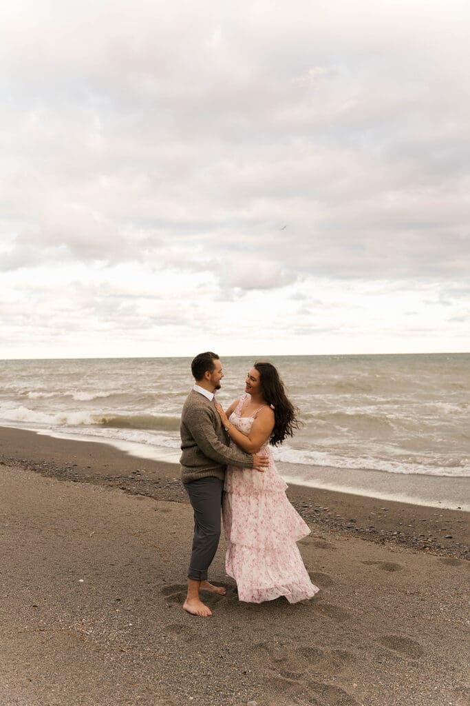 couple laughing with each other during their session
