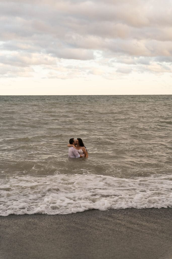 couple kissing during their photoshoot