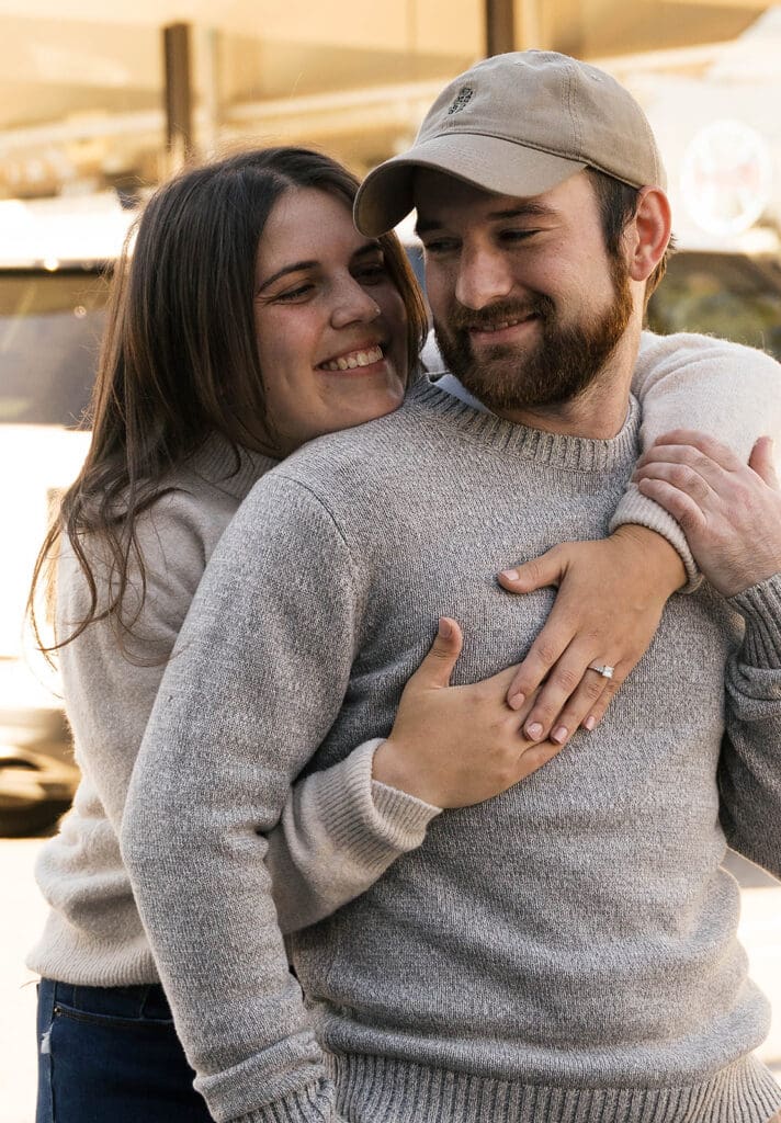 couple laughing with each other during their session