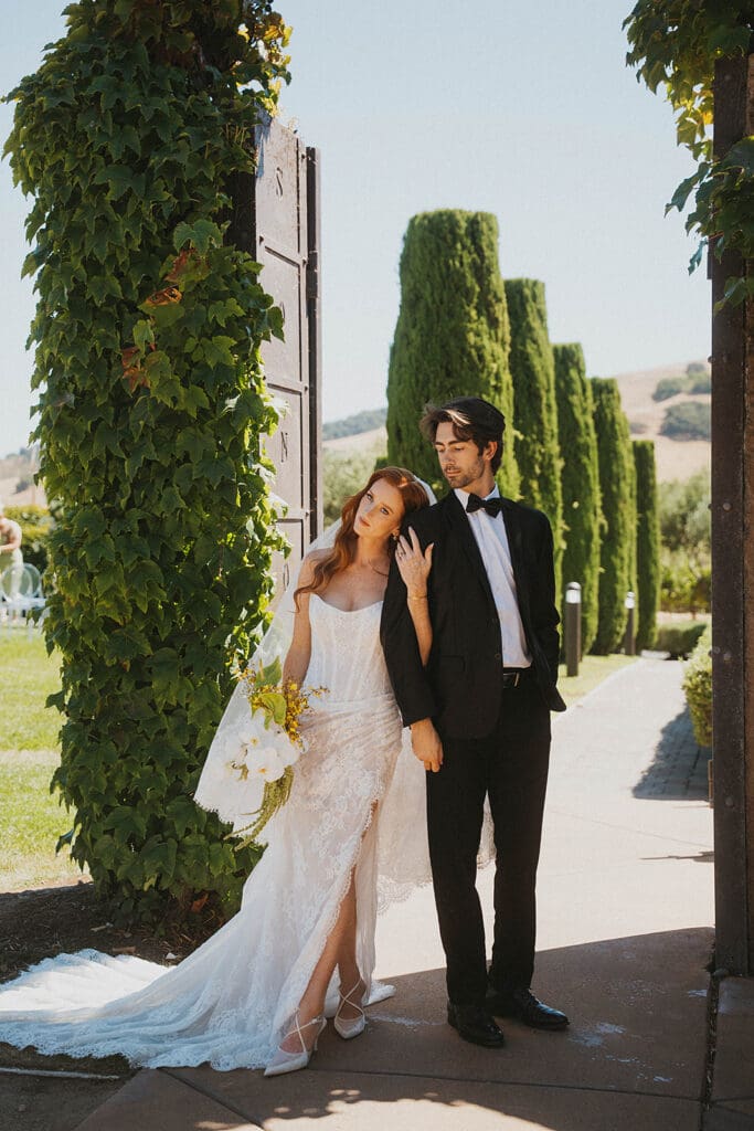 cute picture of the bride and groom holding hands