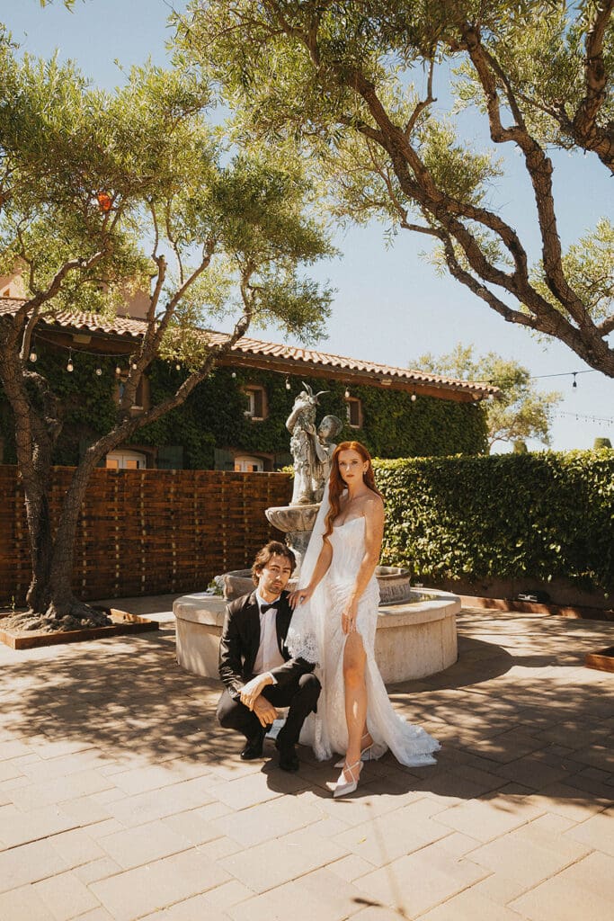 cute picture of the bride and groom smiling at the camera during their bridal portraits