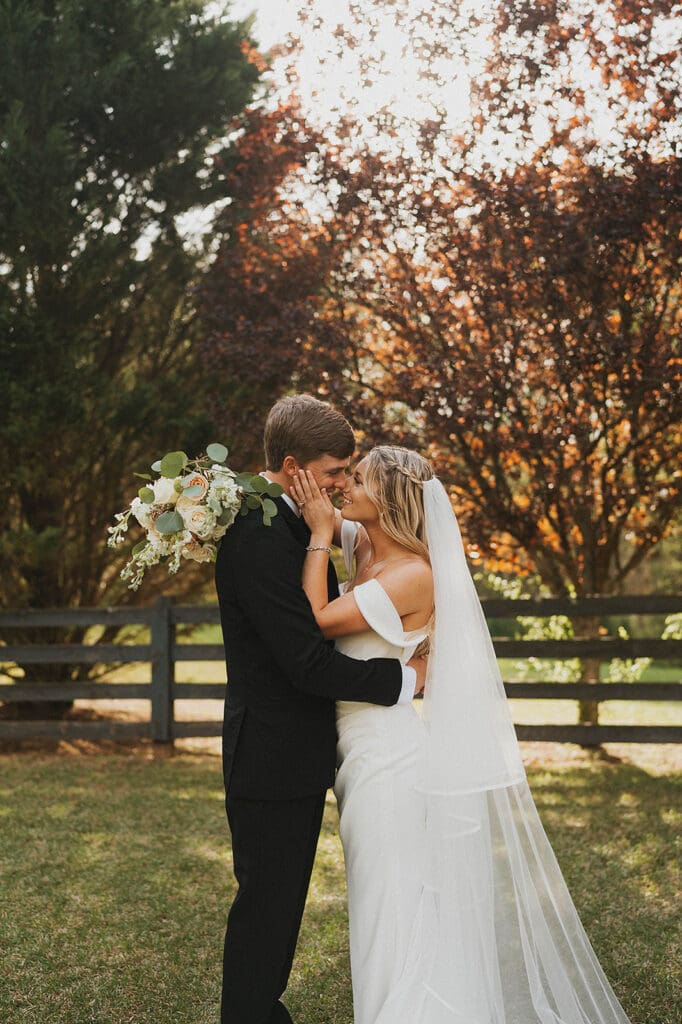 cute picture of the newly married couple smiling at each other