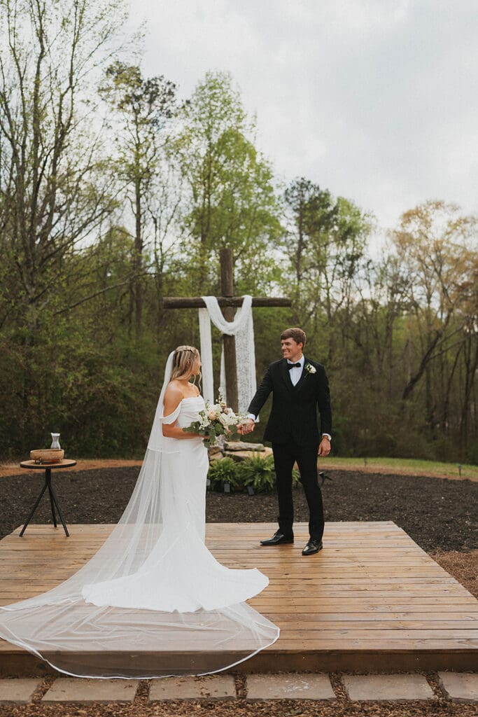 bride and groom at their dream outdoor atlanta wedding