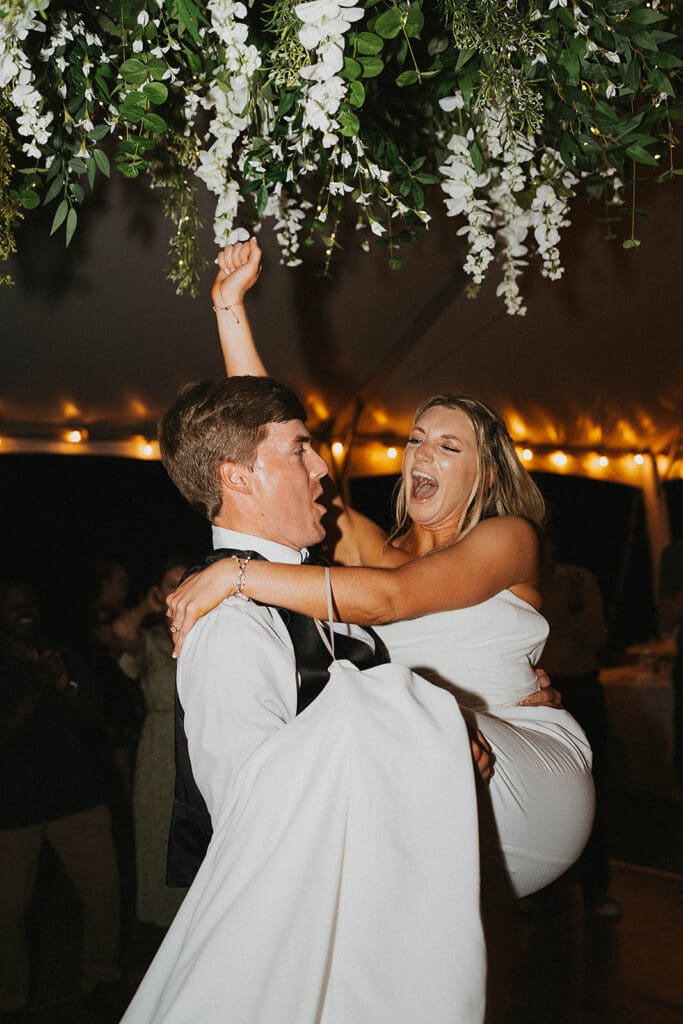 couple dancing at their reception party
