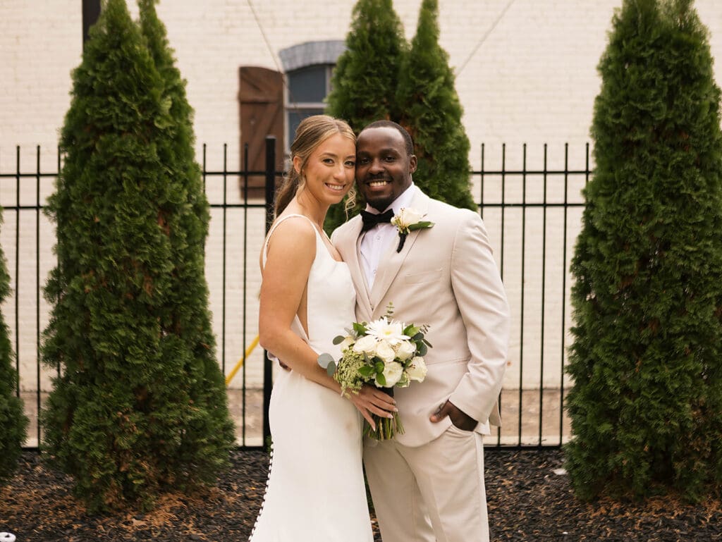 cute picture of the bride and groom smiling at each other