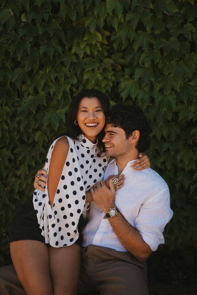couple laughing with each other during their photoshoot