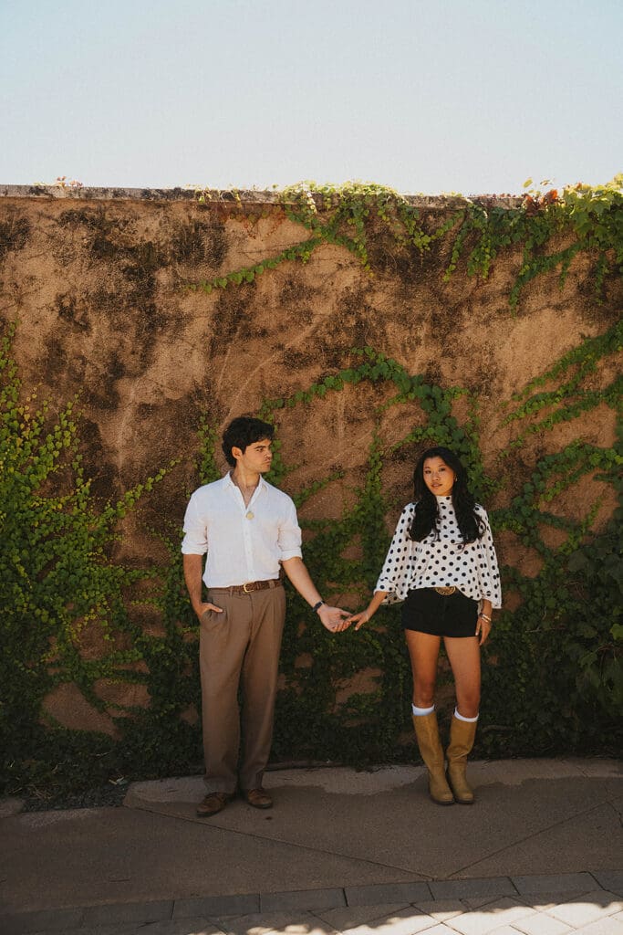 cute picture of the newly engaged couple holding hands